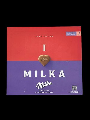 Шоколадні цукерки Milka Praline Cu Crema De Alune 110г, 10шт/ящ 1677583138 фото