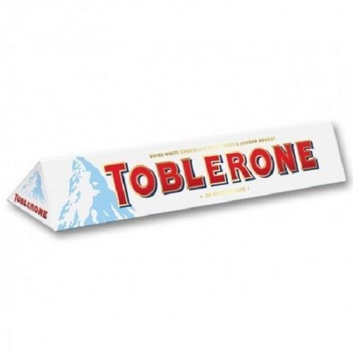 Швейцарський білий шоколад Toblerone з медом та мигдальною нугою, 100 г 1689006079 фото